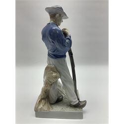 Two Royal Copenhagen figures, comprising Farmer with scythe, no 685 and Girl and calf, no 779, both with impressed and printed marks beneath, largest H26cm
