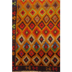  Persian Baluchi rust ground rug, decorated with repeating lozenge design, 195cm x 126cm  