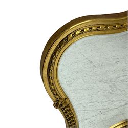 Wall mirror in shaped gilt frame with ribbon pediment