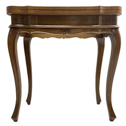 French design inlaid mahogany games table, sliding fold-over top with releasing mechanism to underside, decorated with scrolling foliate inlays and central chequerboard, raised on cabriole supports