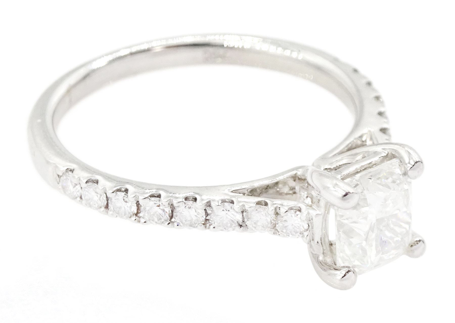 18ct white gold diamond ring, set with a single cushion cut diamond of 1.01 carat, with round brilliant cut diamond shoulders, hallmarked, with International Gemological Institute Report