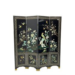 Japanese Shibayama style black lacquered four panel folding screen, naturalist scenes of trailing branch and blossom flowers, decorated with with birds, floral mother of pearl inlaid borders