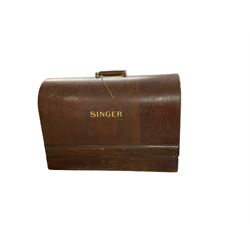 Cased Singer sewing machine, with two table lamps including a brass corinthian column example