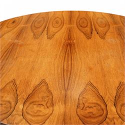 Mid-century Merrow Associates rosewood and chrome dining table, the circular top with striking rosewood veneers, raised on a chromed steel base of eight supports joined by a central ring stretcher