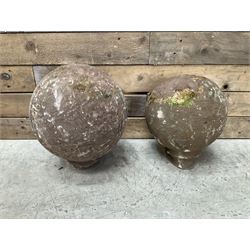 Two spherical stone gate post finials