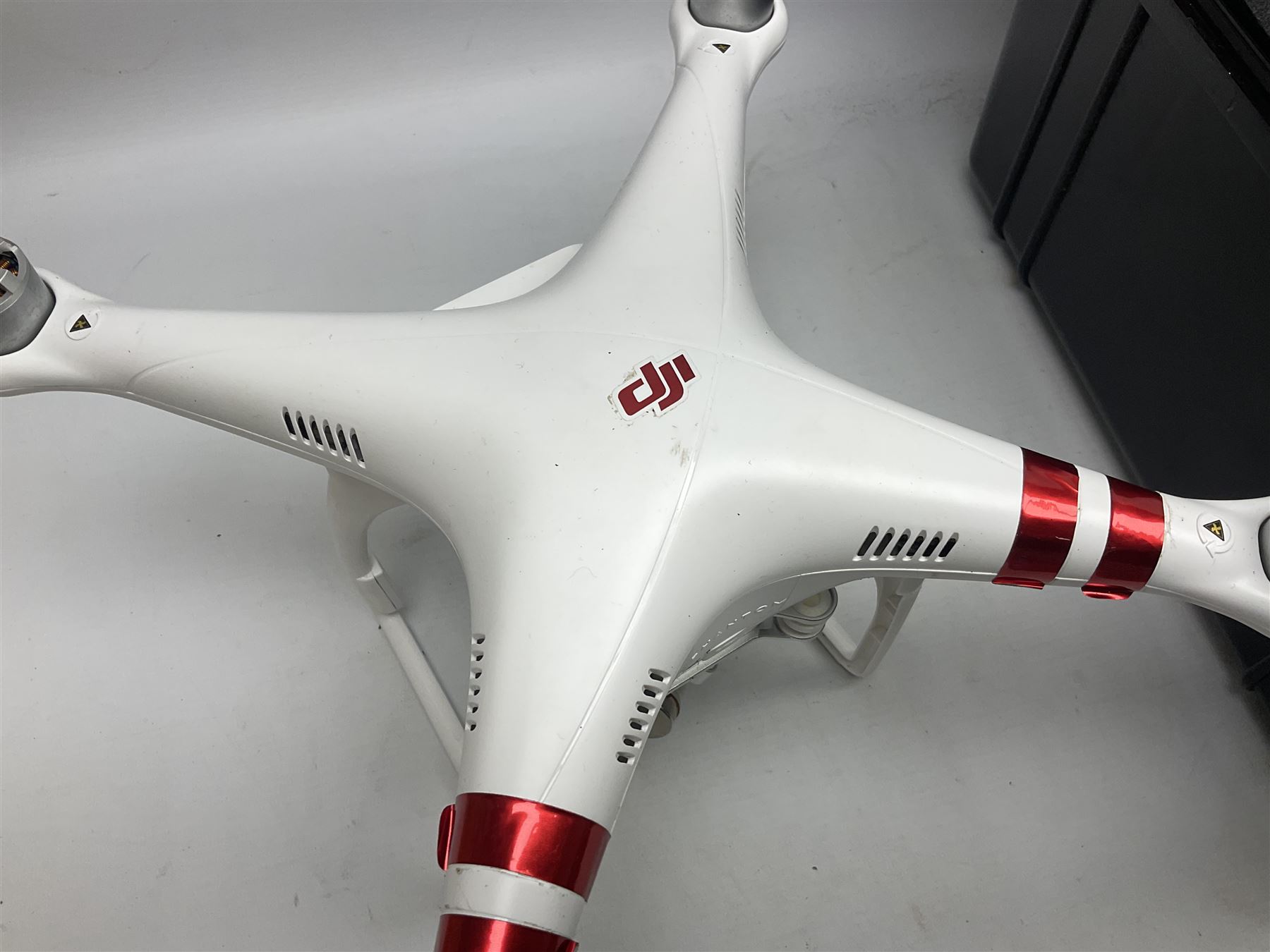 DJI Phantom 2 Vision Plus 3.0 drone, with controller, battery pack, blades, chargers and other accessories in fitted foam lined hard plastic case