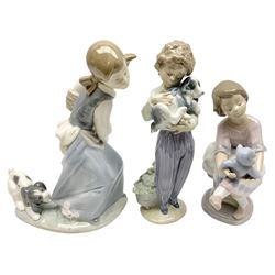 Three Lladro figures, comprising Naughty Dog no 4982, Best Friend 7620 and My Buddy no 7609, largest example H22cm