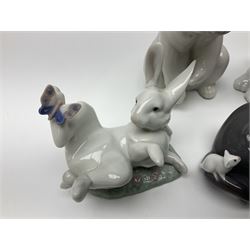 Five Lladro figures, comprising Cat and Mouse no. 5236, That Tickles no. 5888, Gentle Surprise no. 6210, Little Hunter no. 6212 and Resting Polar Bear no. 1208, largest H12cm