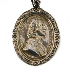 Charles I, silver gilt Royalist Badge, by Thomas Rawlins, Charles I in profile to right, lace collar and doublet, CAROLVS DG MAG BRI FR ET HIB RX, the reverse crowned shield of Royal arms, wreath border around to both sides, H5.2cm