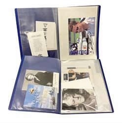 Two folders of over fifty photographs, cards, compliment slips etc of actors, actresses, celebrities, politicians, sports personalities etc, all bearing signatures, including David Frost, Lloyd Grosman, John Suchet, Julia Somerville and othe GMTV presenters, Carol Vorderman, Jackie Collins, Rolf Harris, Timothy Dalton, Pete Postlethwaite, Magnus magnusson, John Major, Kate Moss, Uri Geller, David Beckham, Peter Alliss, Sharon Davies, Kevin Keegan etc