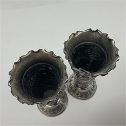 19th century silver plated coffee pot, of bellied form with fruitwood handle and finial, together with a silver plated novelty sugar bowl i the form of a coal scuttle and a pair of silver plated embossed vases, coffee pot H20cm