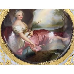Two late 19th century cabinet plates in the manner of Vienna, both finely painted with a portrait of a female beauty, the first depicting Sarah Siddons within interlacing foliate and floral raised gilt borders upon white ground jewelled with small blue enamel dots, the second depicting Victoire of France seated beside a tree with her bow and arrows, within ornate gilt foliate border with trellis detail and painted pink roses upon white ground, signed 'Kies' and 'Kieli' respectively, with red beehive marks, marked Germany and entitled Mrs. Siddons 10174 and Mme. Victoire 10172, D24cm