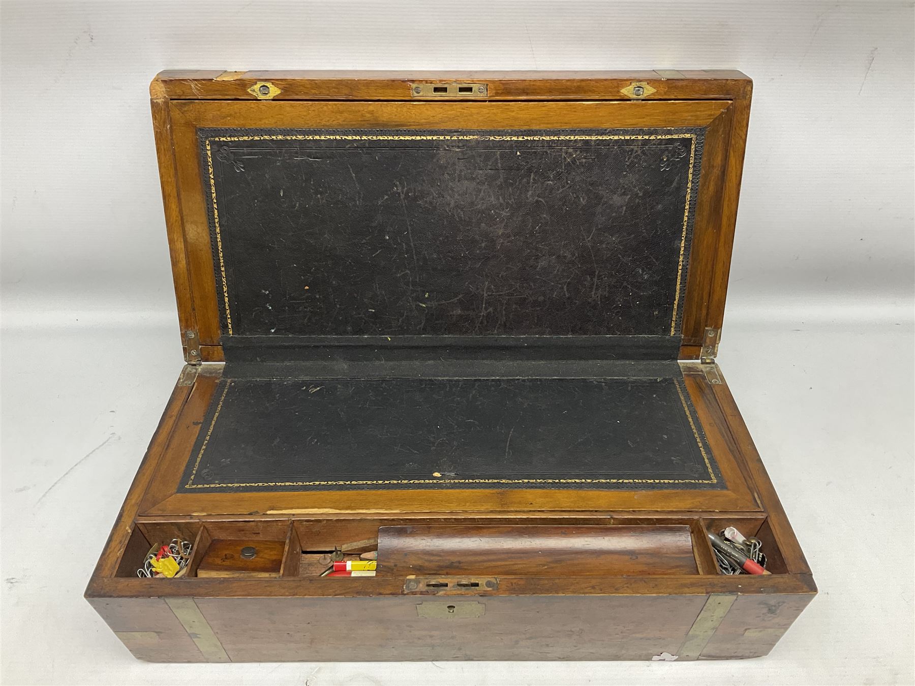 Mahogany brass bound writing box for restoration, the hinged lid lifting to reveal compartmented interior with folding slope, W50cm D25cm H18cm