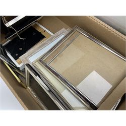 Large quantity of photograph frames, to include wooden, metal, glass and enamel examples, in two boxes 