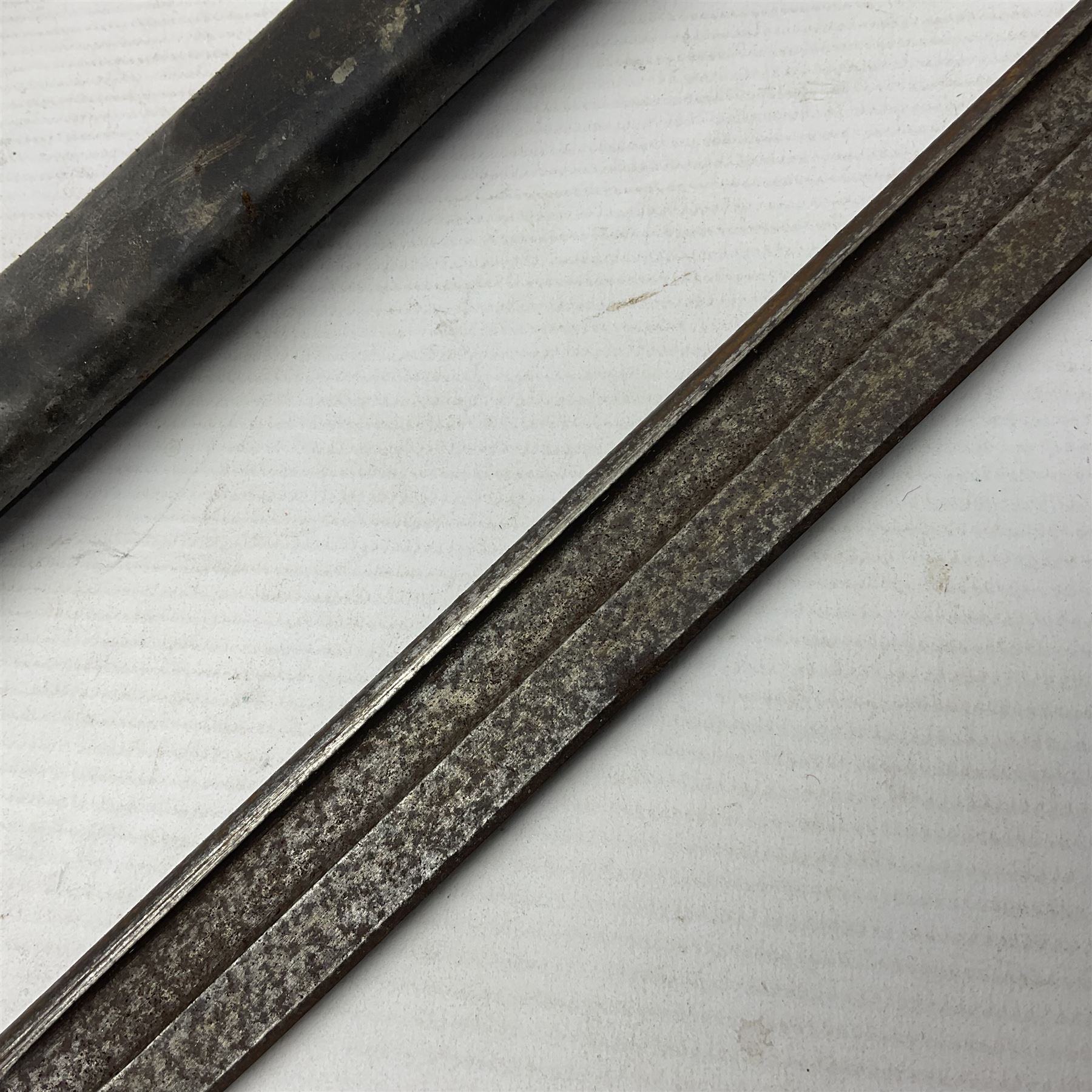 WWI Remington Pattern 1913 bayonet, the 43cm fullered blade with various marks to the ricasso including date code 11 16; in leather covered scabbard with various stamps including JWB 17 L58cm overall; and a French Model 1866 sabre bayonet (no scabbard)