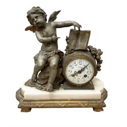 French-early 20th century 8-day patinated spelter and white marble clock garniture, with a seated winged cherub aside a drum clock movement on a white marble base supported on a gilt metal plinth with pad feet, enamel dial with Arabic numerals, minute markers and garland swags, with gilt pierced hands and a twin train countwheel striking movement, striking the hours and half hours on a bell, with a pair of conforming mounted urns.  