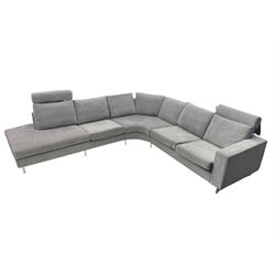 BoConcept 'Indivi 2' corner lounge sofa in grey Matera fabric, three sections with two moveable headrests and brushed steel supports designed by Anders Nørgaard 
