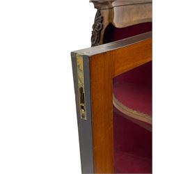 19th century rosewood buffet credenza, bombe form with shaped and moulded top, two central glazed doors with foliate moulded gilt slips, the red fabric-lined interior fitted with a single shelf, flanked by open shelves with raised gilt metal lips, the uprights decorated with shell and flower head carved cartouche mounts, acanthus leaf scroll carved lower mounts, on shaped and moulded plinth base 