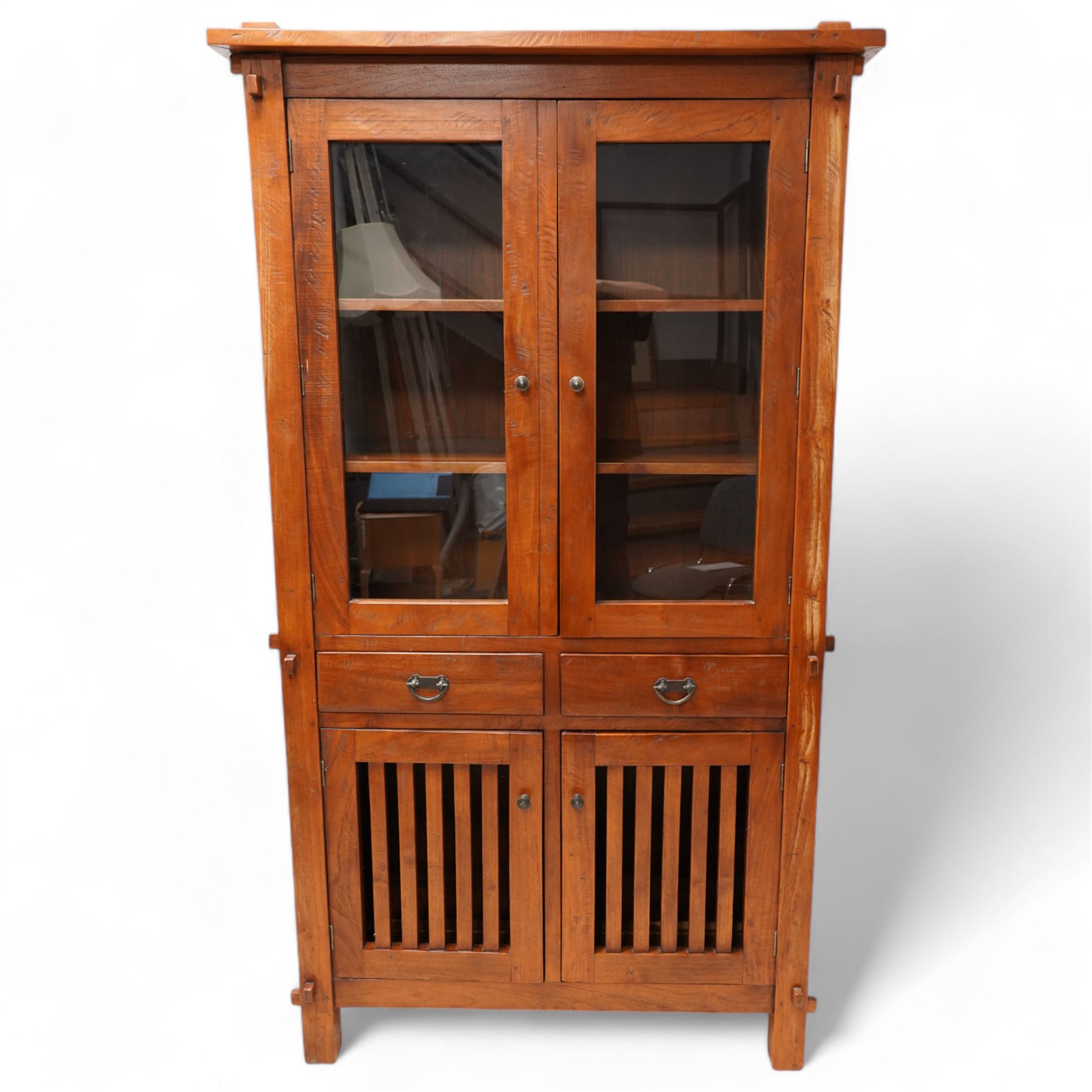 Reclaimed hardwood bookcase display cabinet, fitted with two glazed doors above two drawers, two slatted cupboards to base