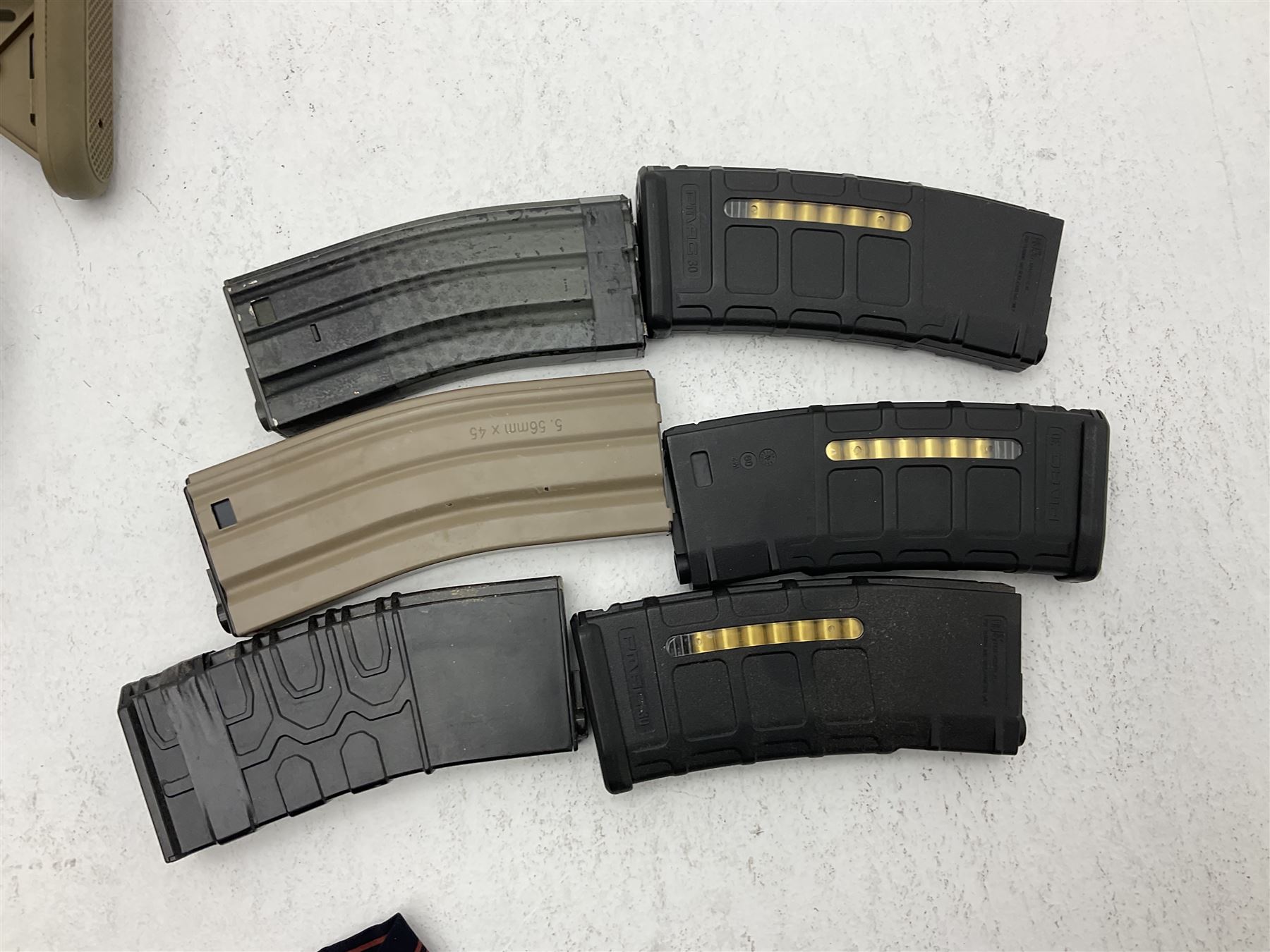 Combat Machine lithium battery powered airsoft BB rifle, 'Complete AEG Series' to fire 5mm pellets, with adjustable length stock L69cm non-extended; with six magazines, Trijicon ACOG red dot telescopic sight, battery charger etc (NO BATTERIES)