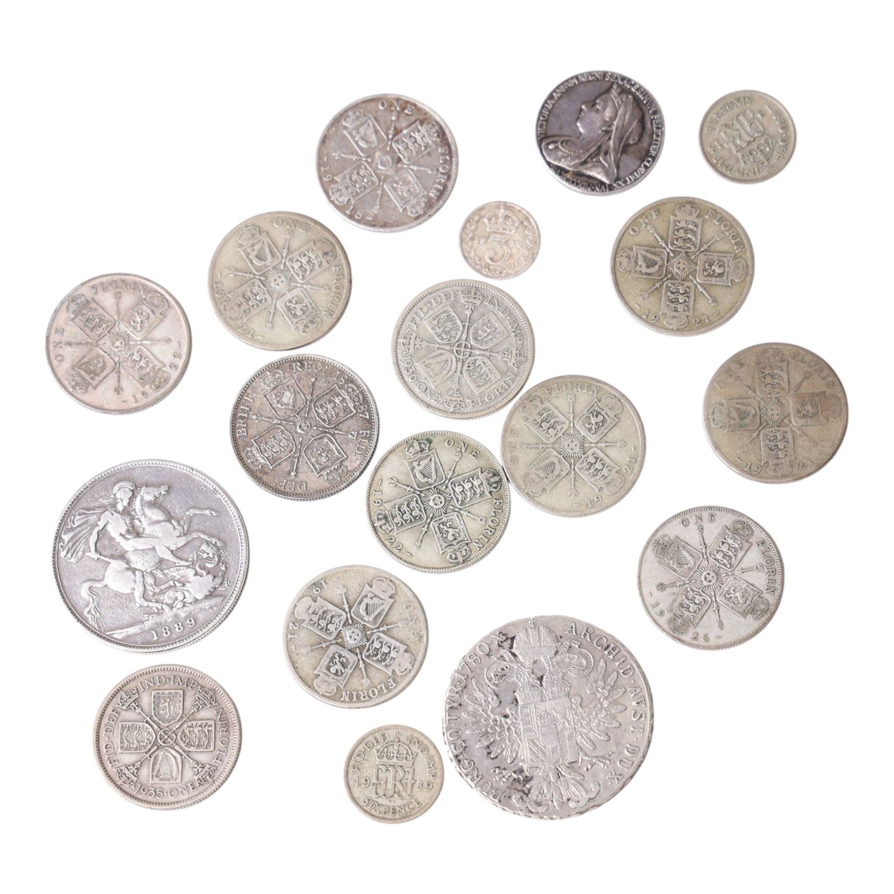 Approximately 51 grams of Great British pre-1920 and approximately 115 grams of Great British pre-1947 silver coins, together with a Maria Theresa silver thaler and a Queen Victoria medallion