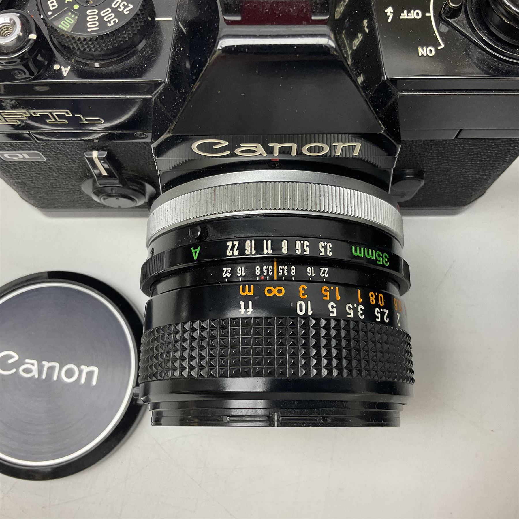 Canon FTb camera body, serial no. 715838, with 'Canon FD 50mm 1:1.8' lens, serial no. 207888, in original box, together with Canon FTb camera body, serial no. 557817, with 'Canon FD 35mm 1:3.5 S.C' lens, serial no. 126210 and Canon EX Auto camera body, serial no. 296244 with 'Canon EX 50mm 1:1.8' lens, serial no. 380869  