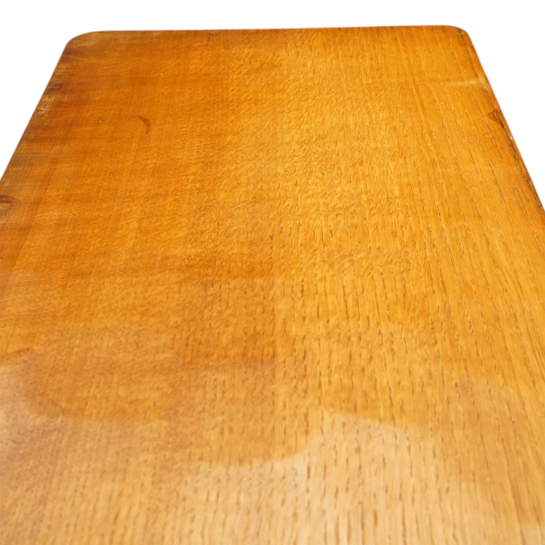 Mouseman - adzed oak rectangular refectory style coffee table, with rectangular adzed top, raised on octagonal supports united by a stretcher, with carved mouse signature, by the workshop of Robert Thompson of Kilburn
