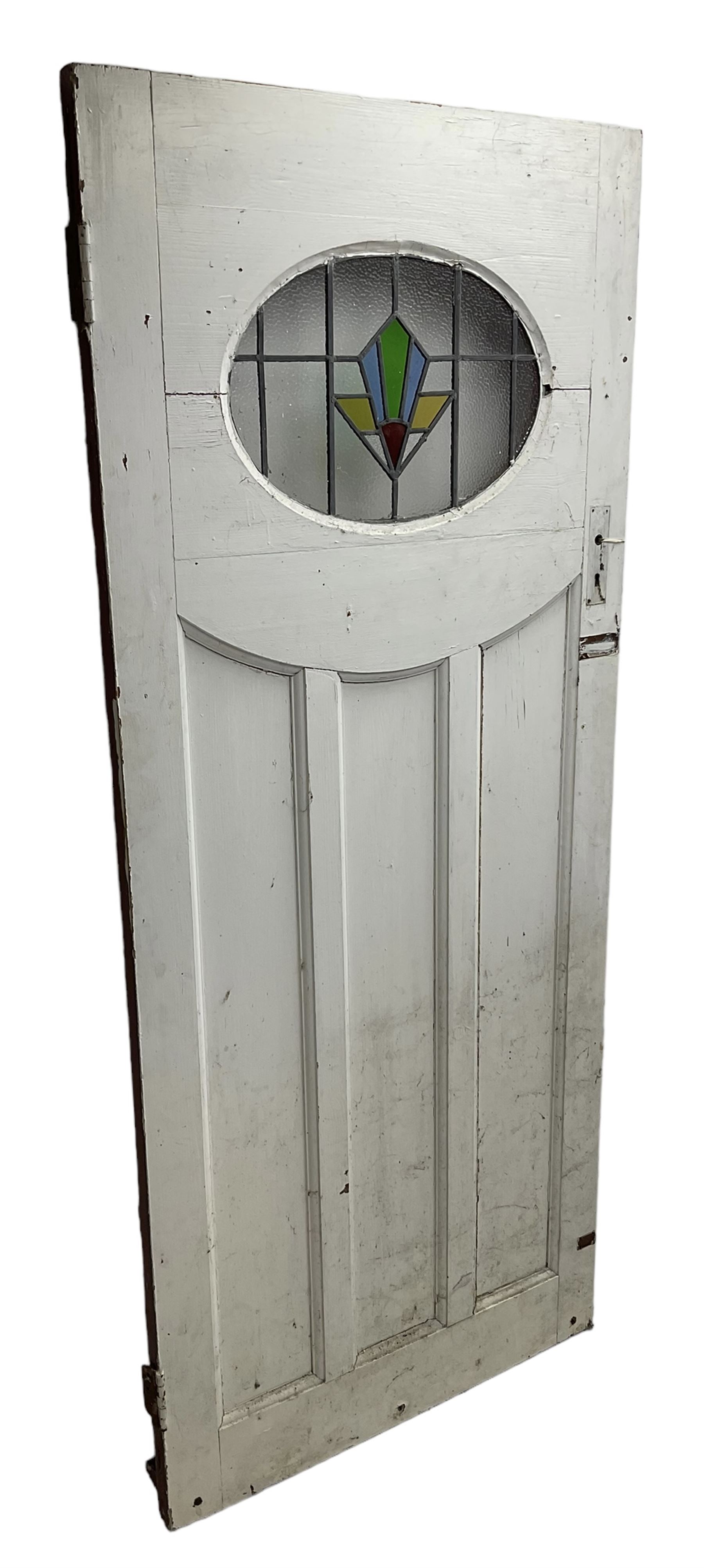 1930s external door with stained leaded glass panel (86cm x 203cm), six small stained glass windows in wooden frames (W52cm); and various loose stained leaded glass panels