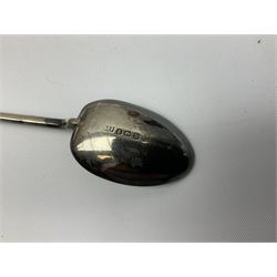 German silver pill box of oval form, the cover decorated with a serpent, stamped with crown and crescent and marked 800, together with a miniature silver capstan inkwell with glass liner, hallmarked Birmingham, a novelty silver teaspoon with golf club terminal, hallmarked Birmingham, and an amber glass scent bottle with silver plated cover, approximate weighable silver (not including inkwell or scent bottle with silver plated cover) 41.9 grams