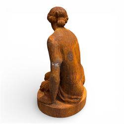 Victorian design cast iron semi-nude seated lady, on oval plinth base