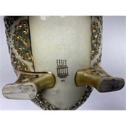 Hungarian Zsolnay Pecs gilt and green reticulated basket, upon four feet, with gold mark beneath, H14cm L21cm