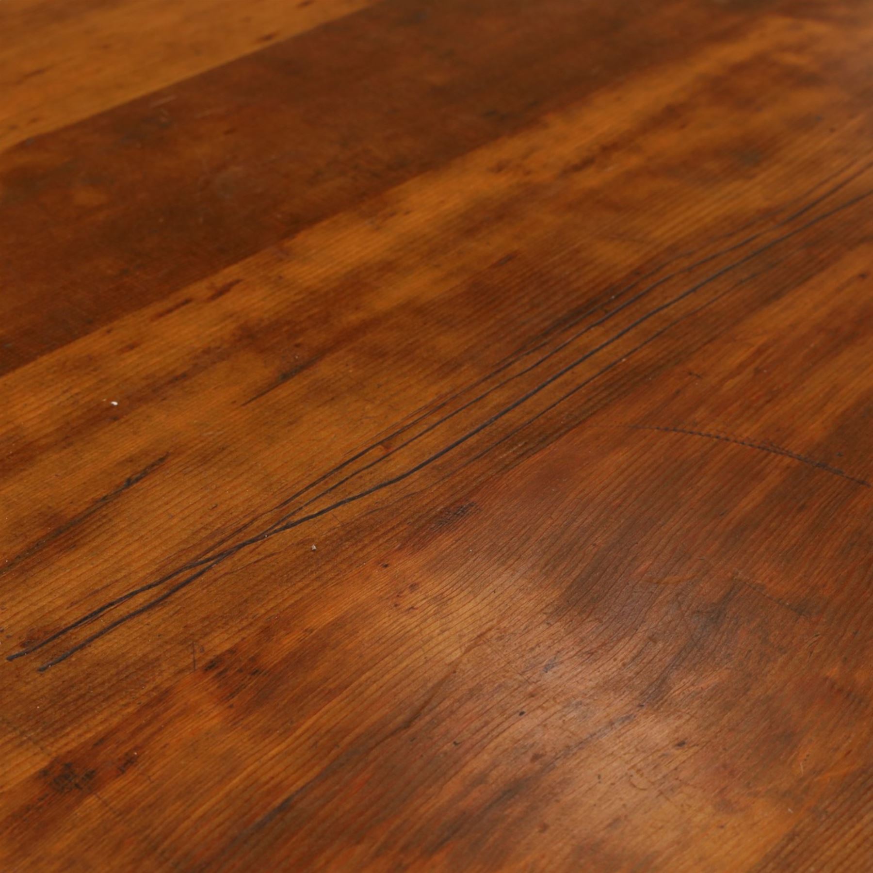Large oak and pine farmhouse table, with pine plank top raised on and oak base with turned supports united by a long stretcher 