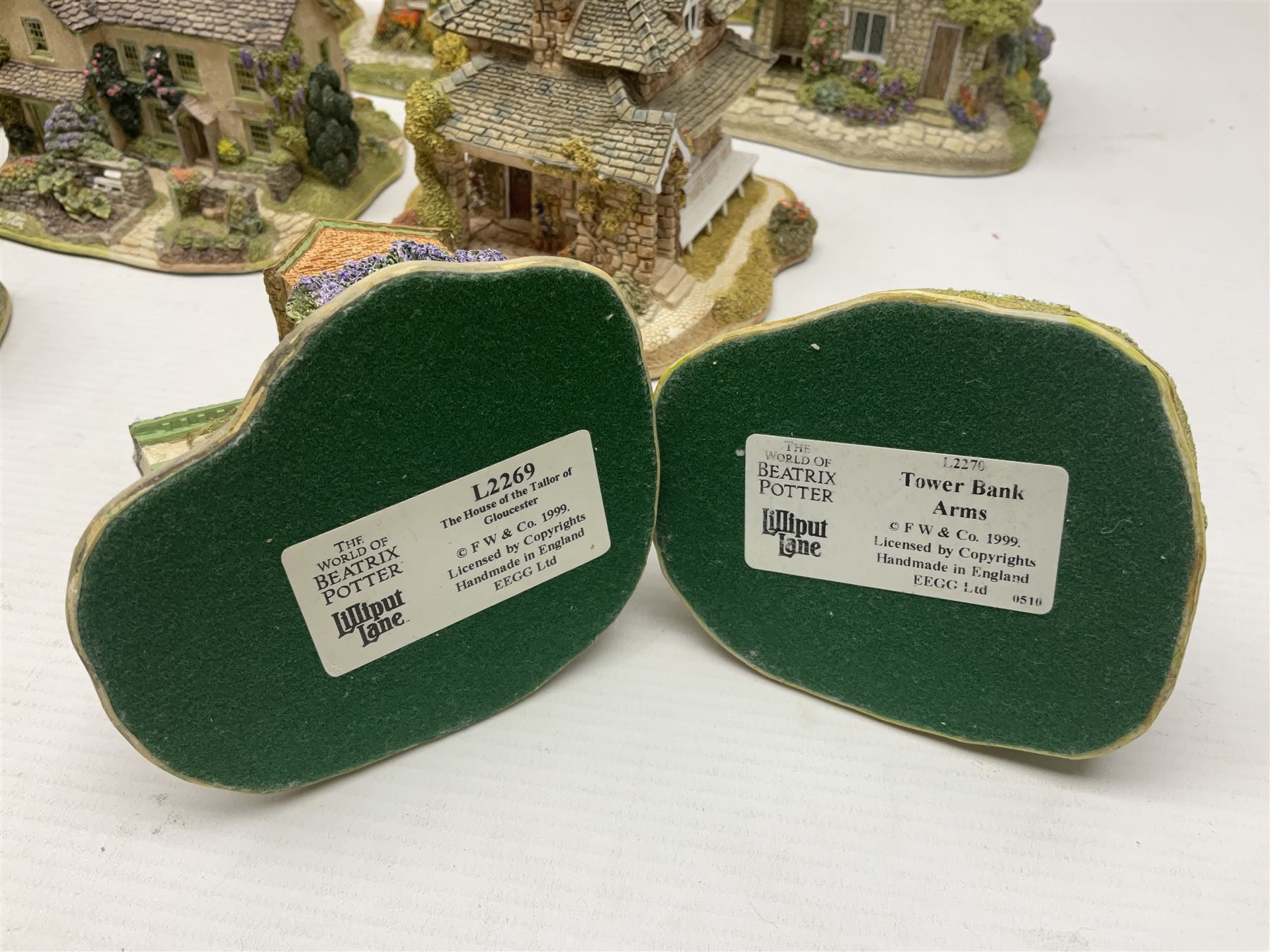 Eight Lilliput Lane limited edition Beatrix Potter models, including Buckle Yeat, Tabitha Twitchits Shop and Ginger Pickles Shop, together with twelve Lilliput Lane models from the Blaise Hamlet collection, including Dial Cottage, Diamond Cottage and Vine Cottage, all with deeds and original boxes (20)