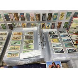 Large quantity of Brooke Bond trade cards, predominantly in sets, contained in three modern loose leaf albums and some original albums; with some loose cards and sets and some unstocked albums