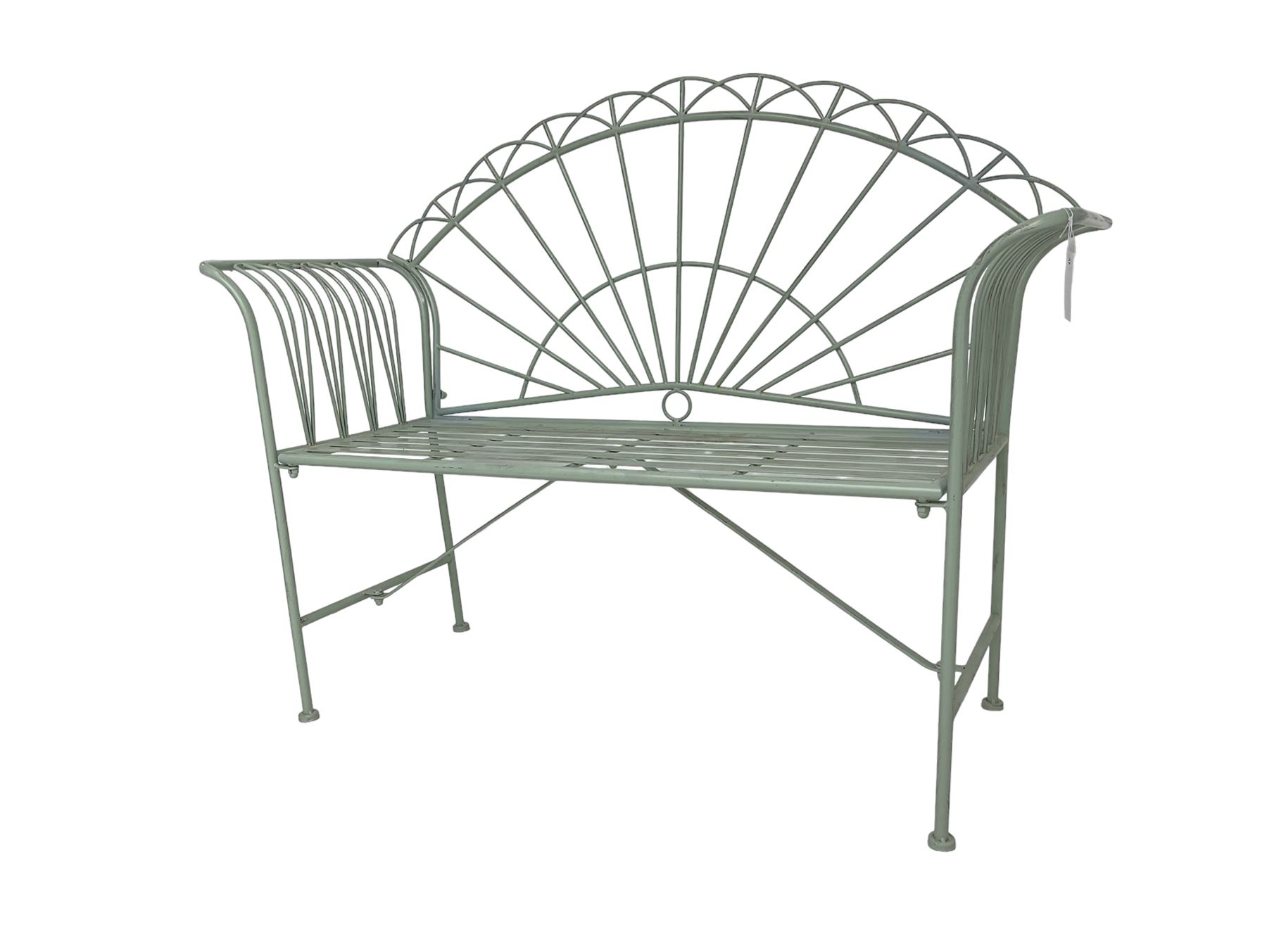 Regency design wrought metal bench, the fan back over out-swept arms, strap seat on supports united by stretchers, in pale teal finish