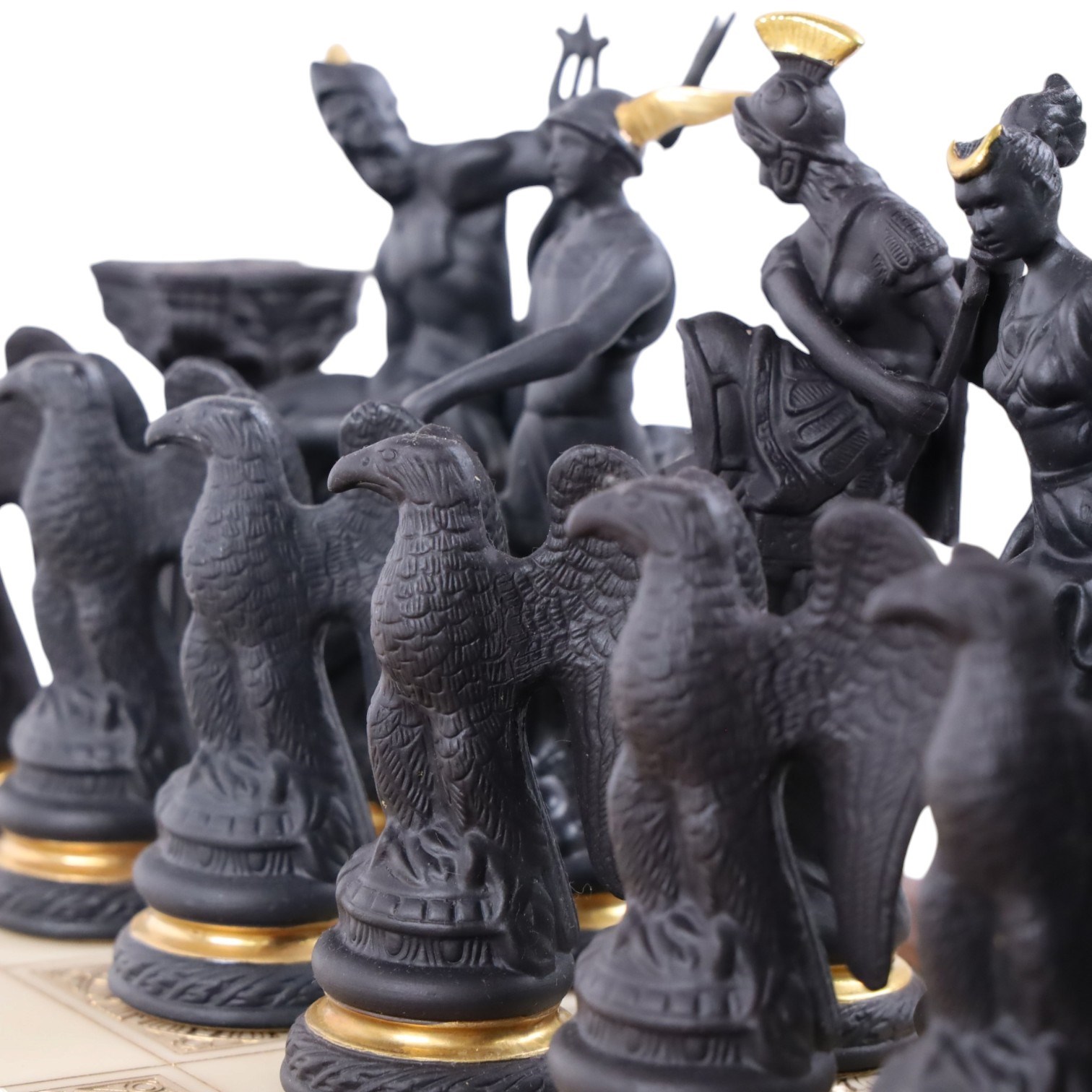 Franklin Mint - The Chess set of the Gods by Stuart Feldman, porcelain pieces, housed in fitted case with certificates 