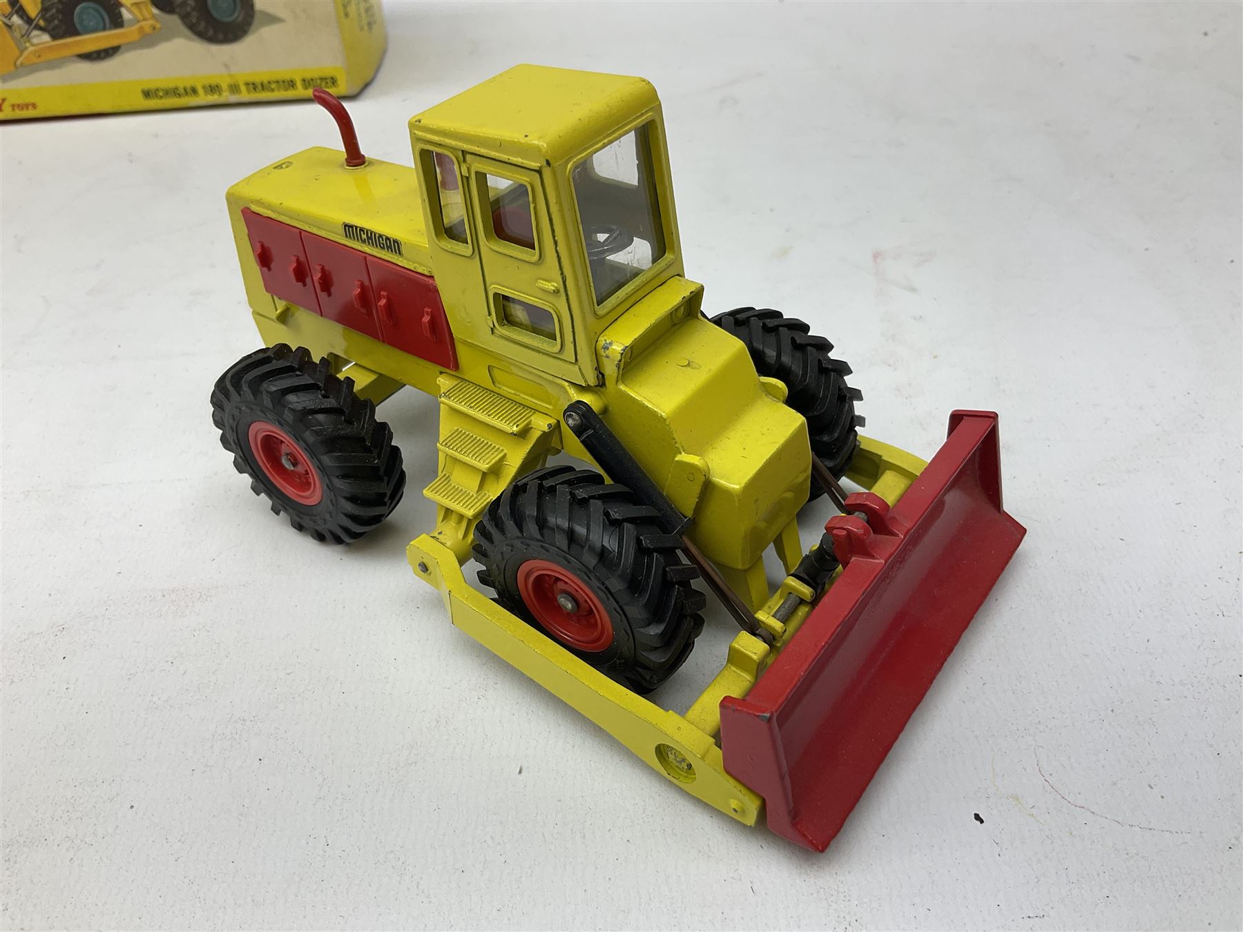 Dinky - Captain Scarlet and the Mysterons Maximum Security Vehicle with crate No.105; Airport Fire Tender with Flashing Light; and Michigan 180-III Tractor Dozer No.976; all boxed (3)