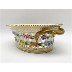 Royal Copenhagen Flora Danica basket, with naturalistically modelled vine handles and reticulated sides detailed with polychrome forget-me-nots, the interior decorated with a botanical study of 'Anagallis arvensis', sprigs and a gilt border, with printed and painted marks beneath, H8cm L26cm 

