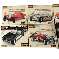 Five Bburago kit built cars and two Bburago diecast models