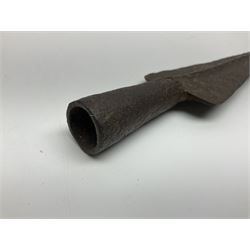 19th century continental folding knife with 15.5cm single edged blade, the pierced brass and iron handle with remains of horn grips L21.5cm overall closed; turned horn handled knife with foliate engraved blade; battlefield relic German 1884/98 knife bayonet; iron spear head; leather covered swagger stick; and two-piece gun cleaning rod