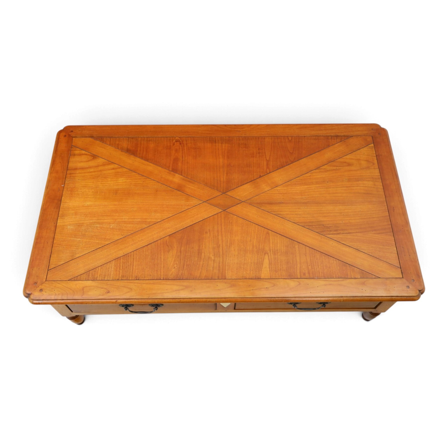 Wesley Barrell - French cherry wood coffee table, rectangular top inlaid with a geometric cross design, stone inlay with two frieze through drawers and metal drop handles, on short turned supports
