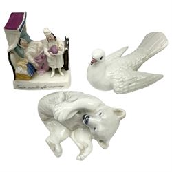 Royal Copenhagen figure of a playing polar bear cub, together with a fairing 'Twelve Months after Marriage',  and a figure of a dove (a/f)