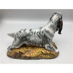 Royal Doulton model of an English setter carrying a pheasant, HN 2529, designed by Frederick Daws, H21cm