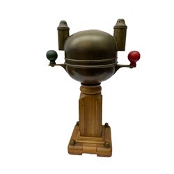 Ship's 'Sestrel C-Y' binnacle by Henry Browne & Son, the wooden base surmounted by the brass compass top, with a glass viewing window and magnetic counter spheres, H53cm