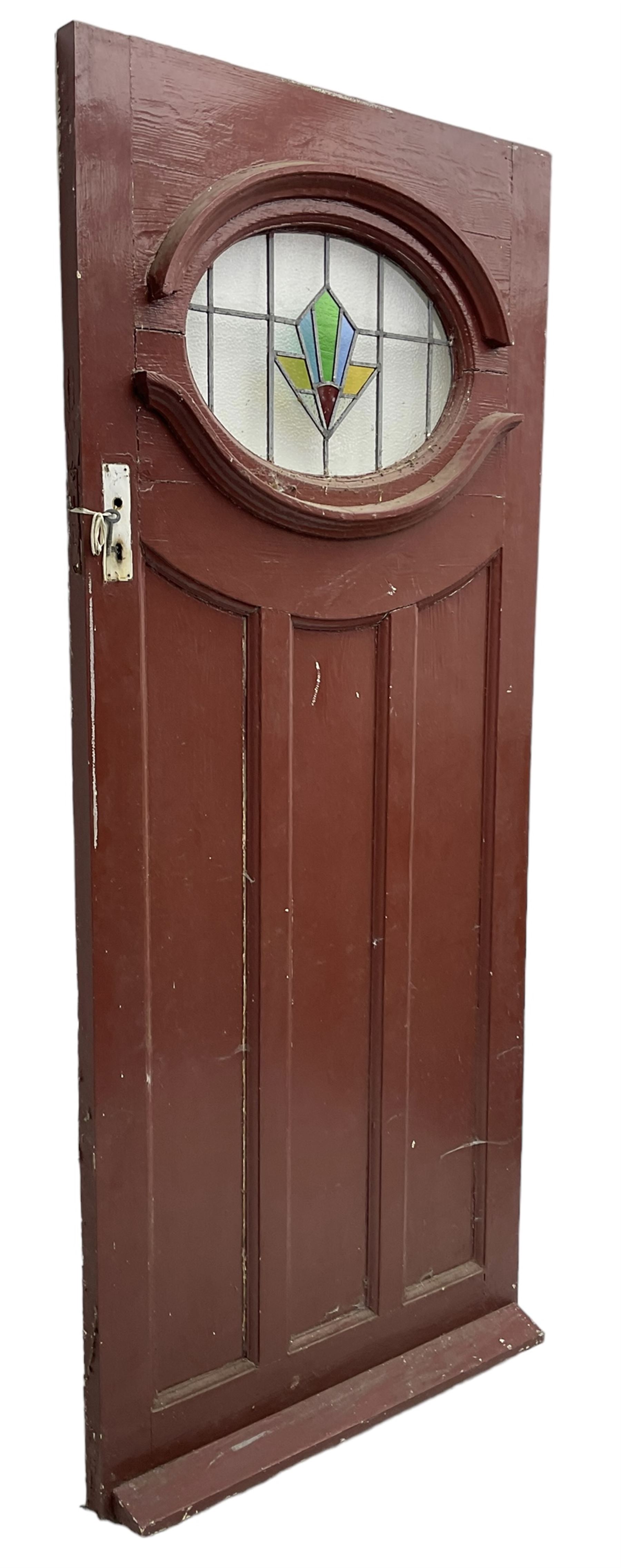 1930s external door with stained leaded glass panel (86cm x 203cm), six small stained glass windows in wooden frames (W52cm); and various loose stained leaded glass panels