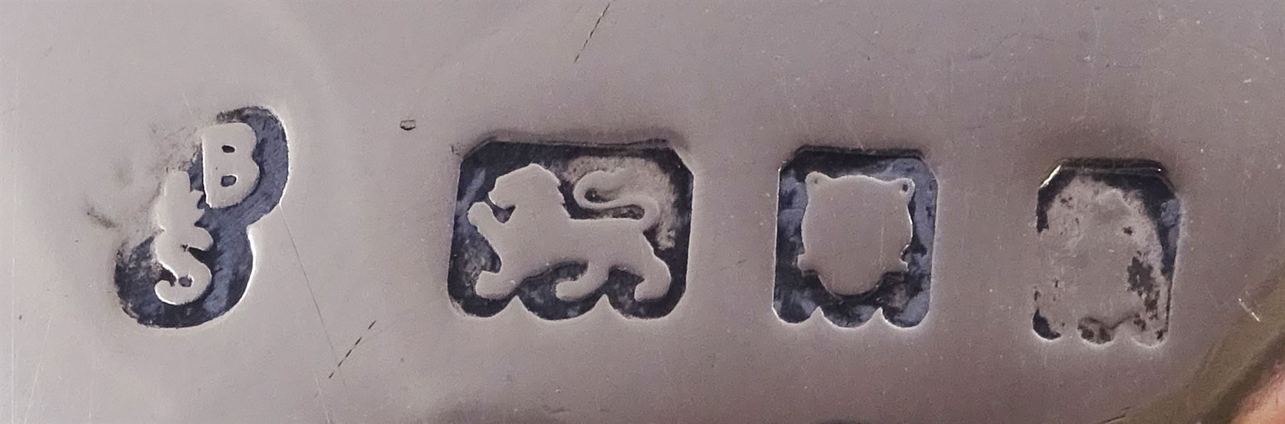 1920s silver trophy cup, with angular twin handles, upon knopped stem with circular spreading foot, the body with presentation engraving 'Burniston & District Show, presented by S Fox Linton TD MD, for the Best Agricultural Mare or Gelding, 10 miles radius, 1928' and engraved with winners verso, hallmarked Charles Boyton & Son 1921, upon black plastic base, including base 25cm