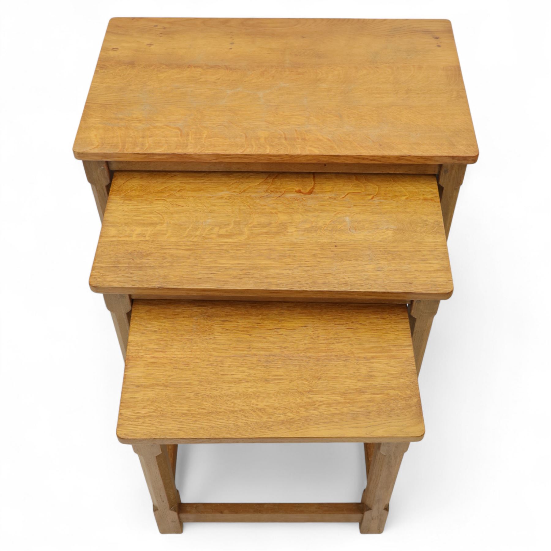 David 'Oakleafman' Langstaff - oak nest of three tables, each with a rectangular adzed top, with signature leaf motif on the bottom stretcher, from the workshop of David Langstaff, Easingwold, Yorkshire