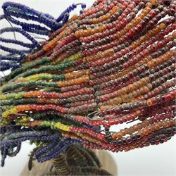 Victorian bead and wire model of a parrot, of polychrome beads, with glass eyes, on a wooden base, H24cm