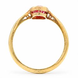 Early 20th century gold padparadscha sapphire ring, milgrain set with a single oval cut sapphire of approx 1.05 carat