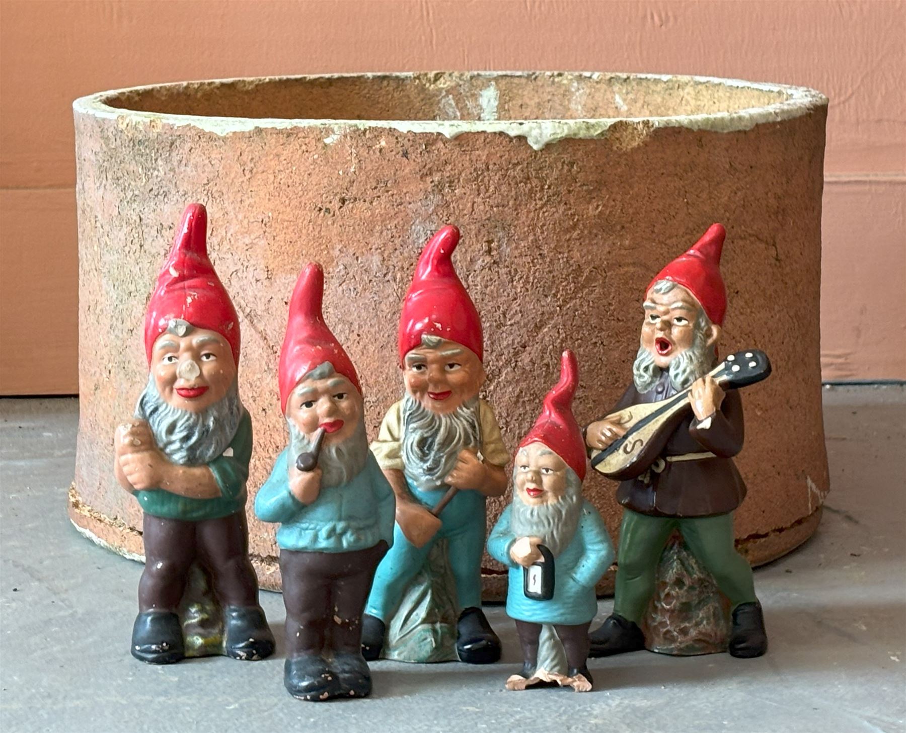 Group of painted terracotta garden gnomes, (5) together with a broken terracotta planter / sagar (D44cm)  - COLLECTION BY APPOINTMENT FROM: The White House, Thirsk Road, Easingwold, York, YO61 3NF - CALL 01723 507111 TO ARRANGE